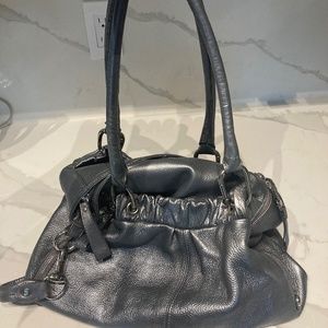 Large silver B Makowsky bag